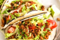 Crispy Tofu Tacos with Tangy Slaw and Avocado crema