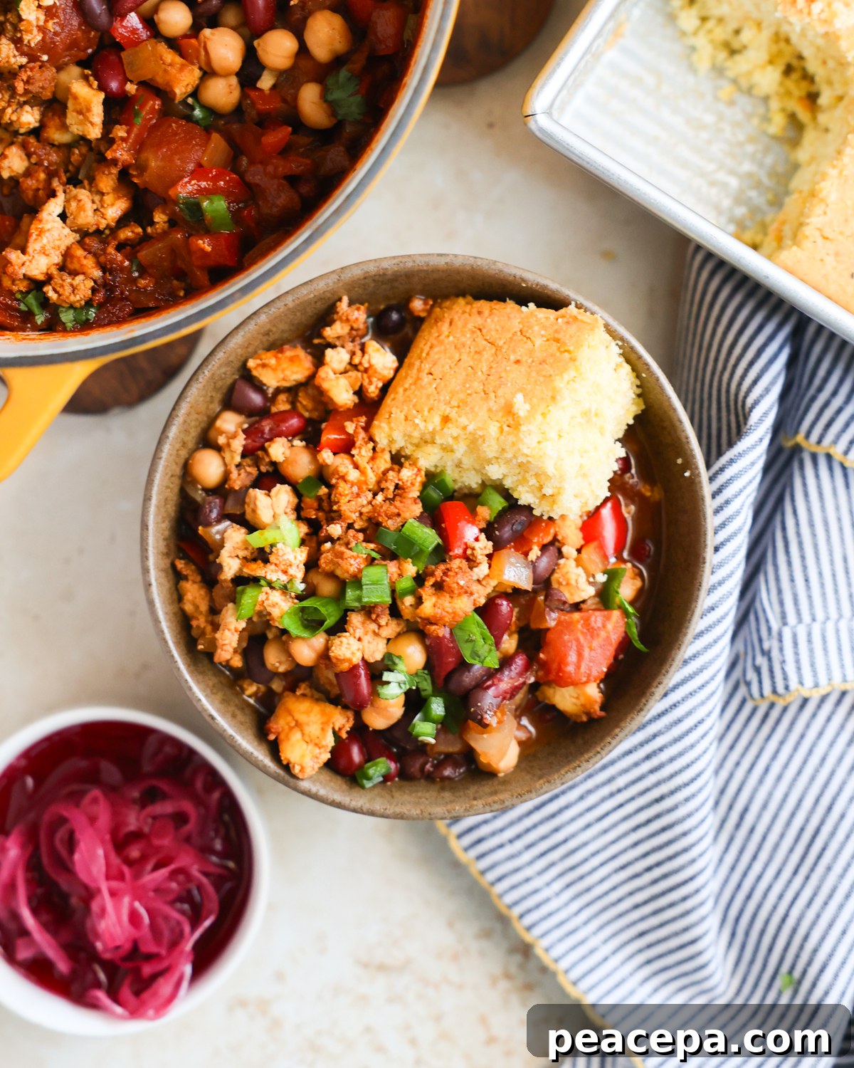 chili and cornbread in a bowl