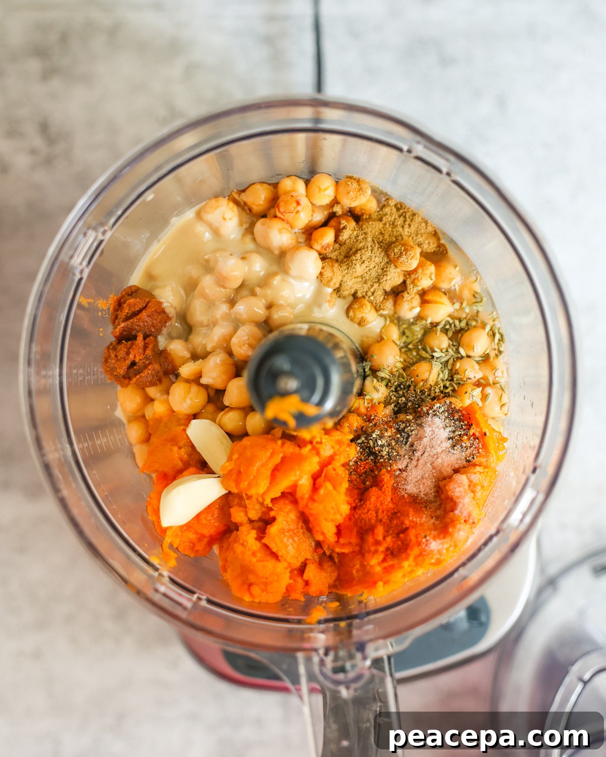overhead of sweet potato hummus ingredients in blender