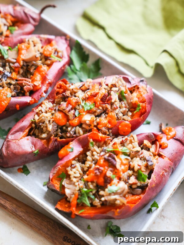 Stuffed sweet potatoes on platter.