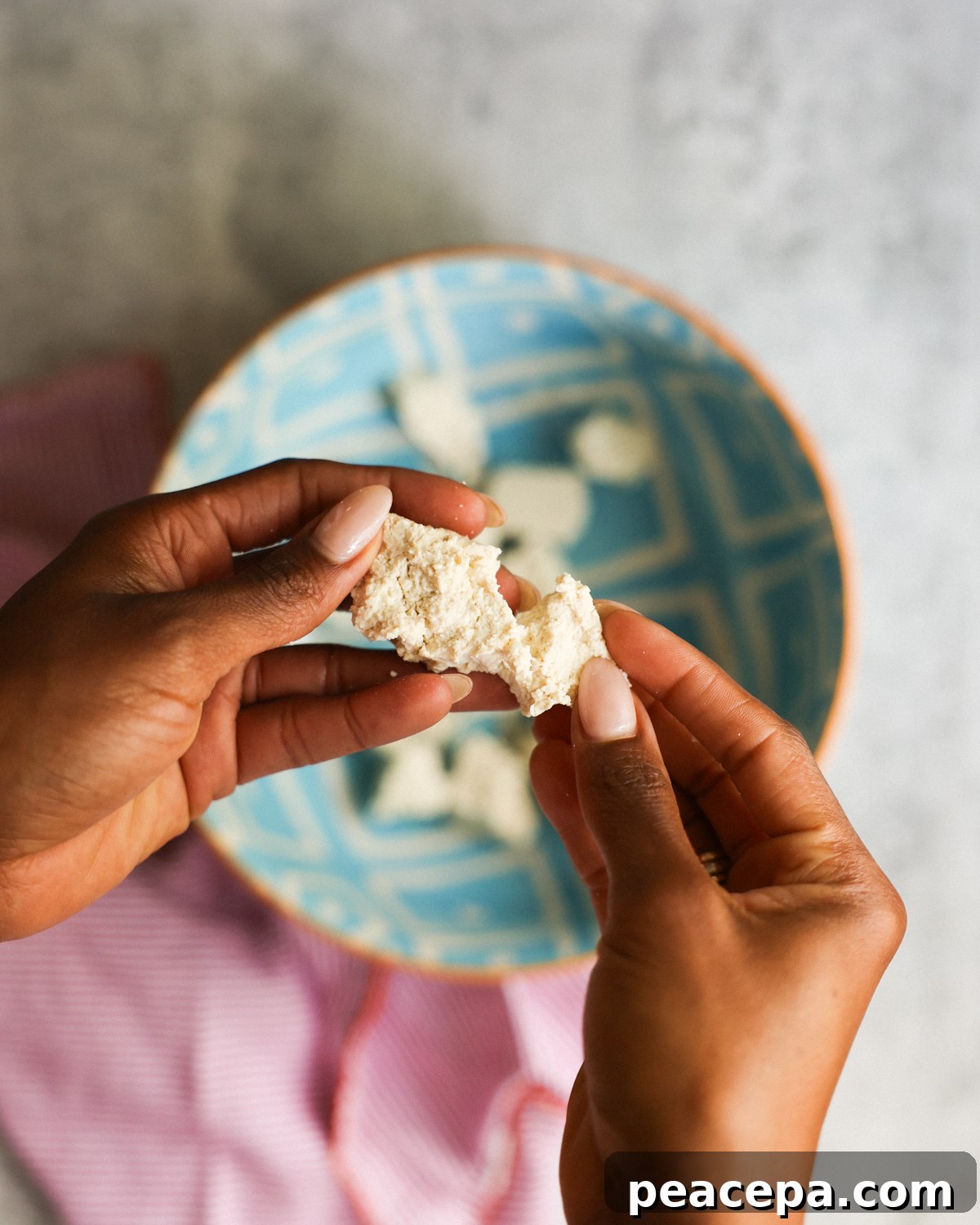 pulling apart tofu for nuggets