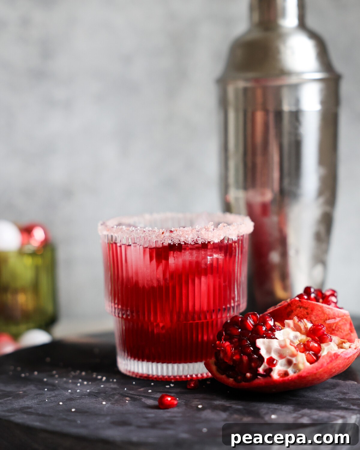 Pomegranate margarita on tray.