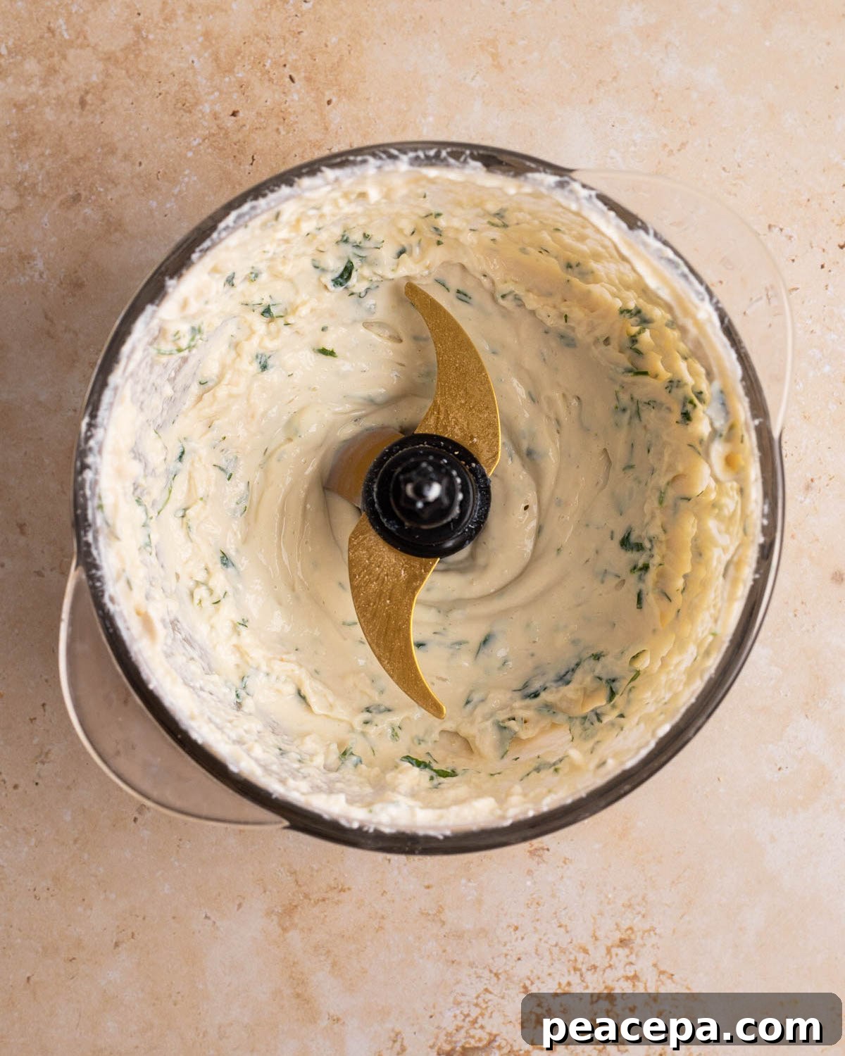 overhead of vegan ranch dip in a food processor