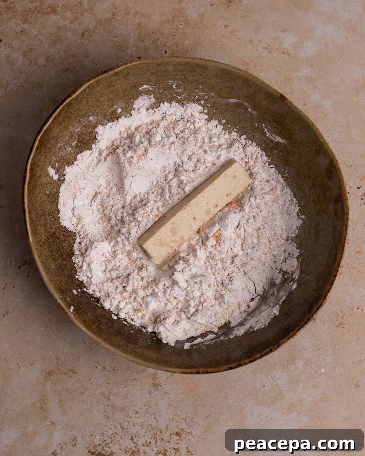 coating tofu in spiced dredge