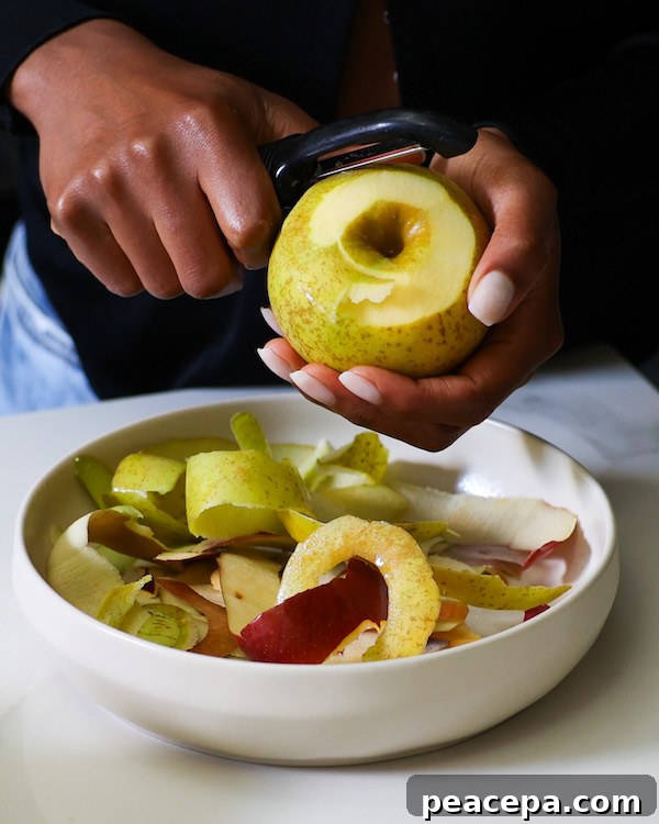 Peeling apples into a white bowl.