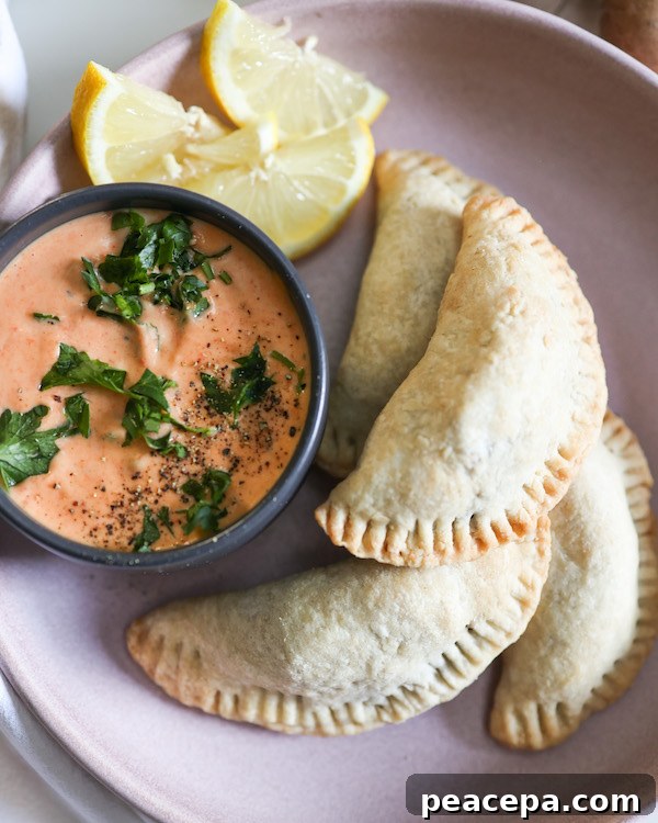 overhead of vegan empanadas on a plate