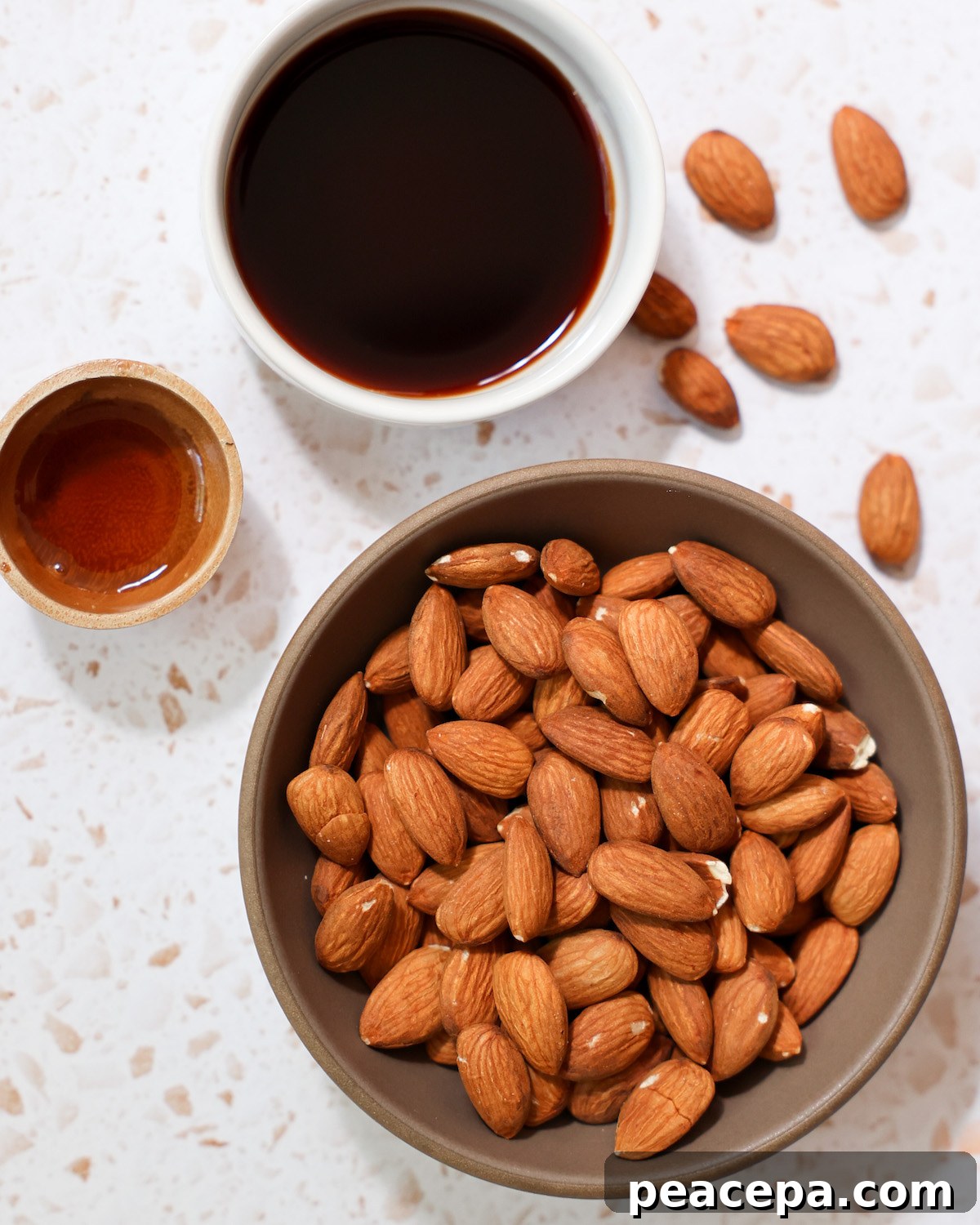 An overhead shot of all of the ingredients for roasted tamari almonds.