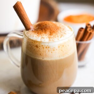 side view of sweet potato latte topped with cinnamon