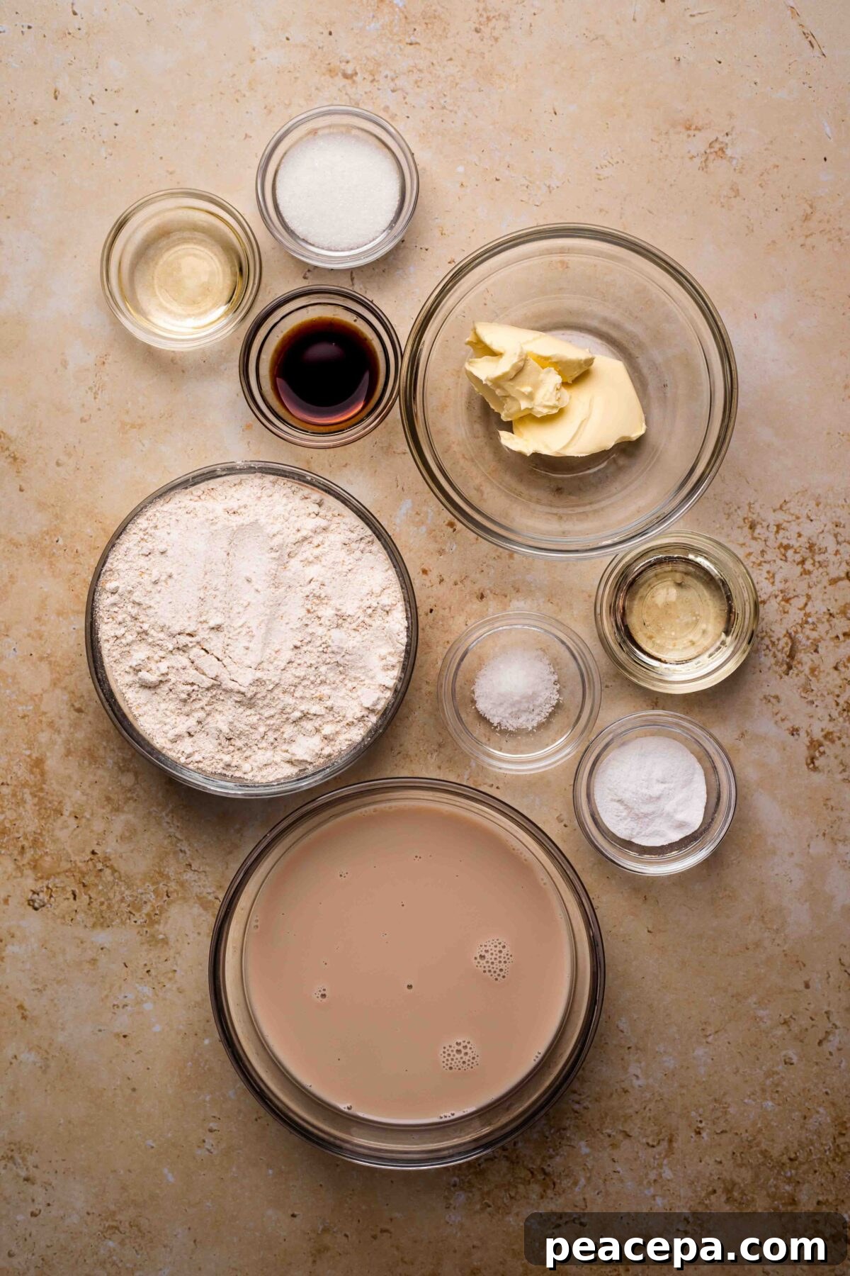 An overhead shot of all of the ingredients for the spelt pancakes on the counter.