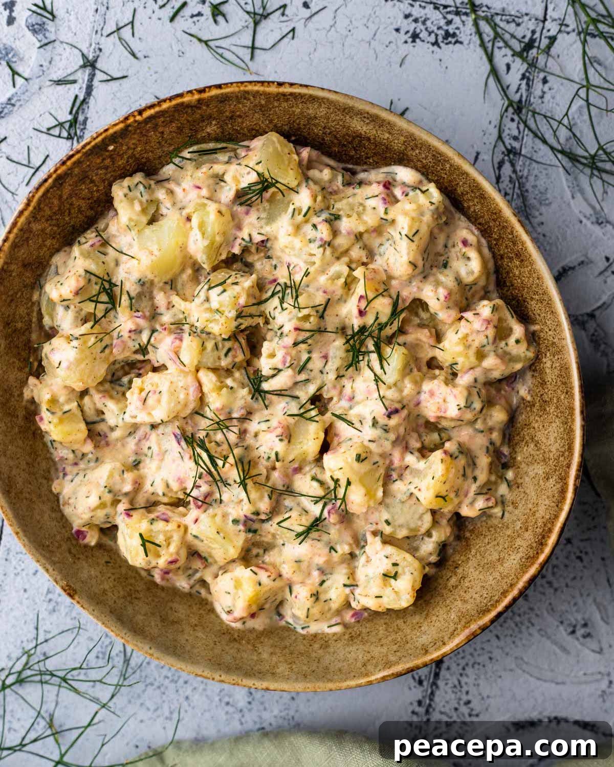 overhead of vegan potato salad in a serving bowl