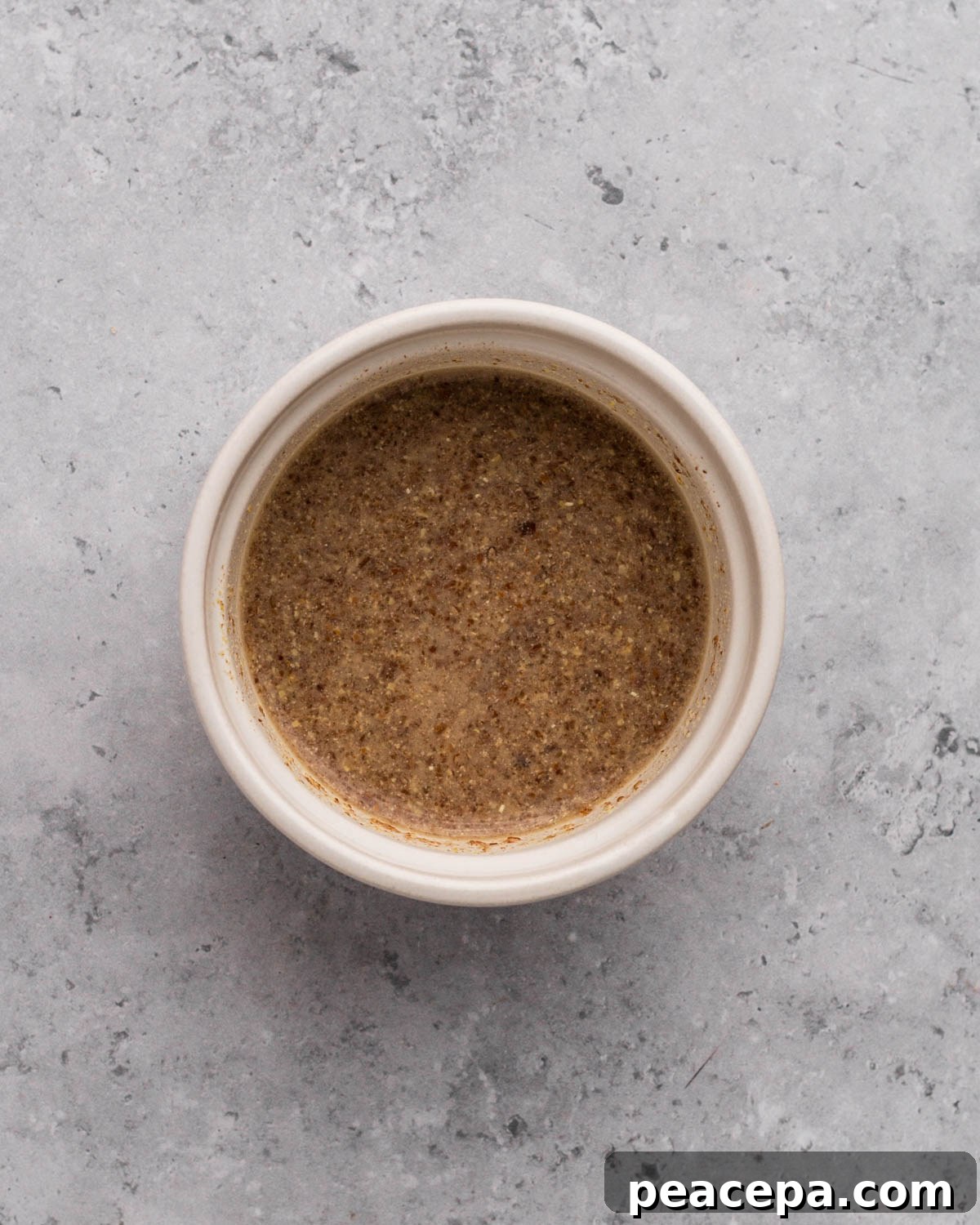 overhead of flaxseed egg in a small bowl