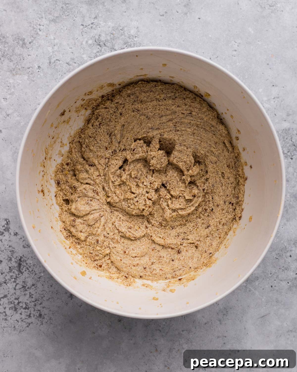 overhead of wet batter for Vegan Oatmeal Chocolate Chip Cookies