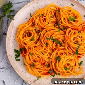 swirls of Gochujang Buttered Noodles on a plate