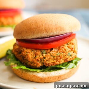 Zucchini burger on a bun.