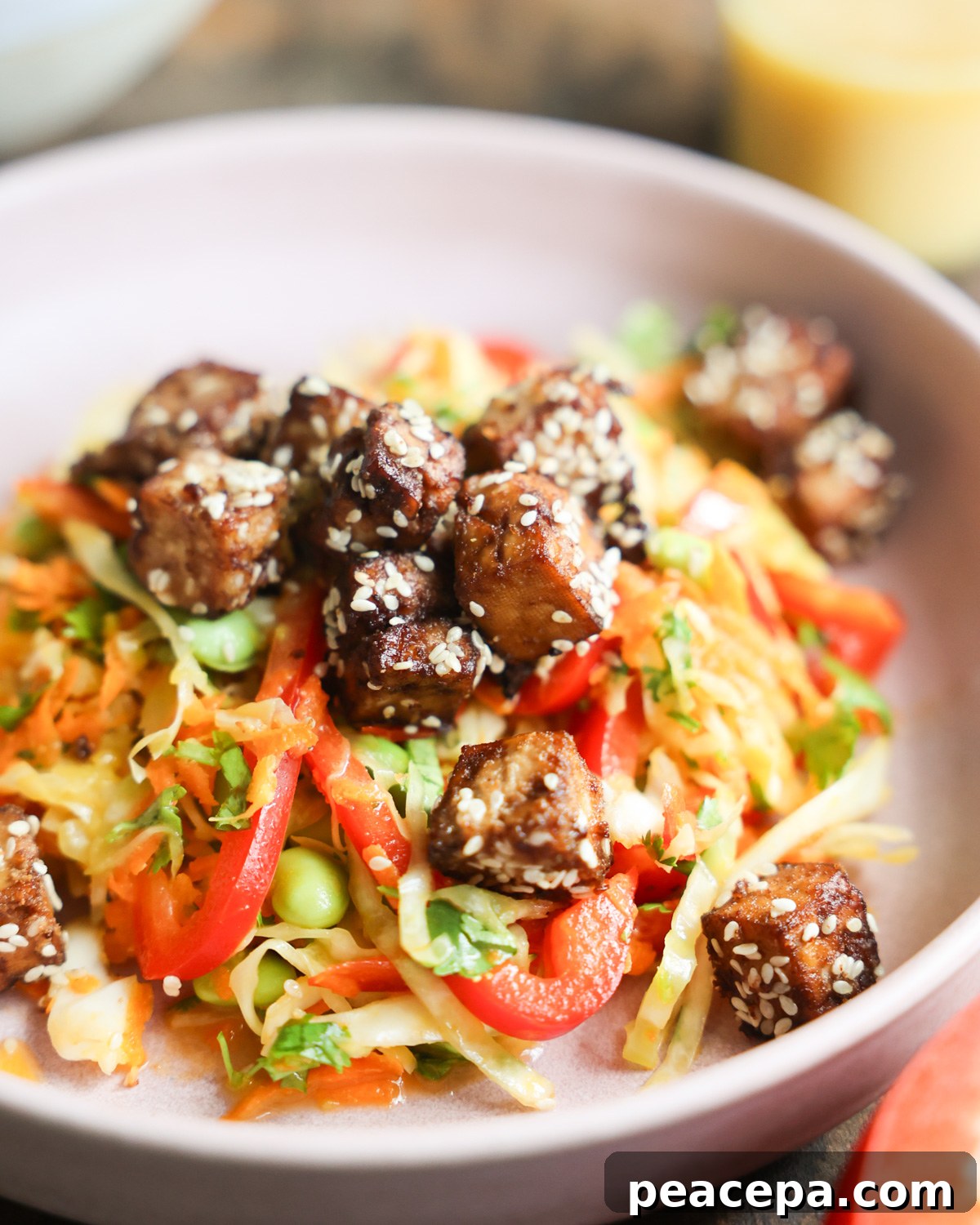 A close up shot of Crunchy Sesame Tofu Salad in a bowl.