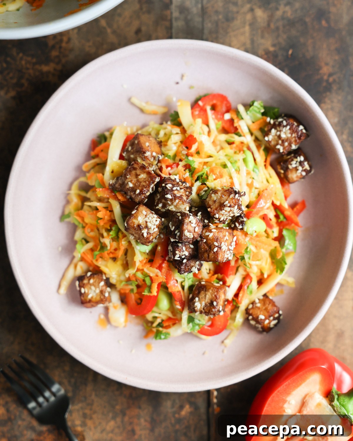 An overhead shot of a bowl of Crunchy Sesame Tofu Salad.