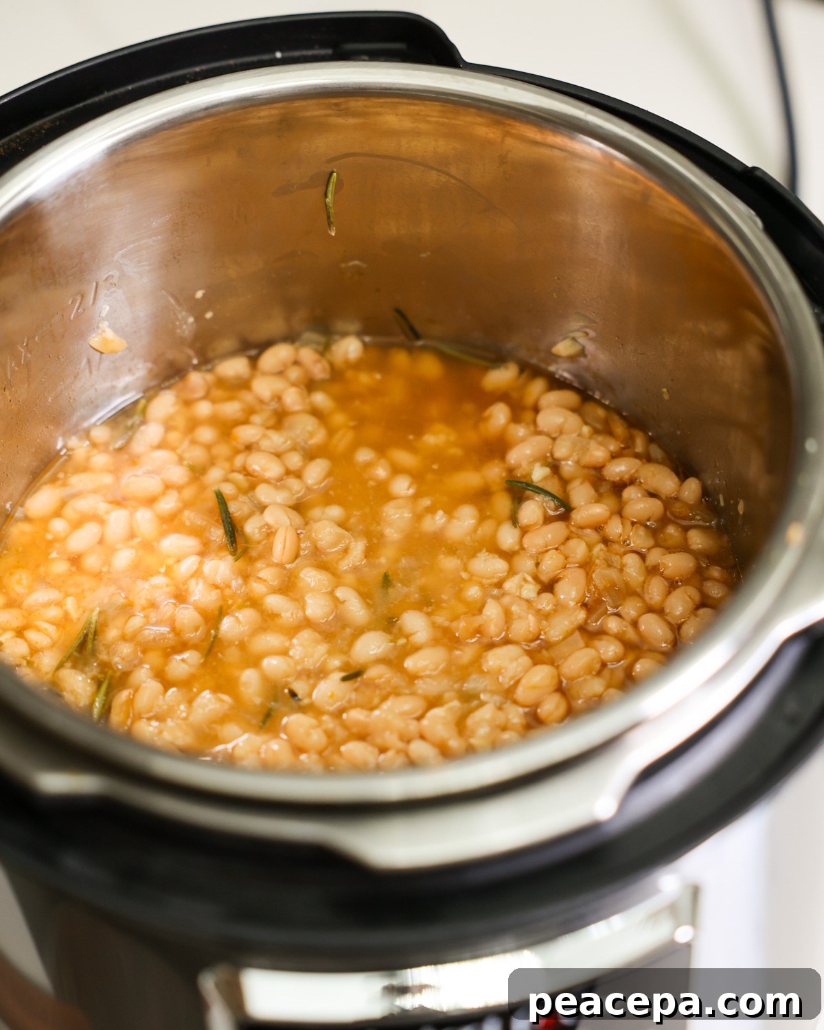 Creamy cooked white beans in the Instant Pot.