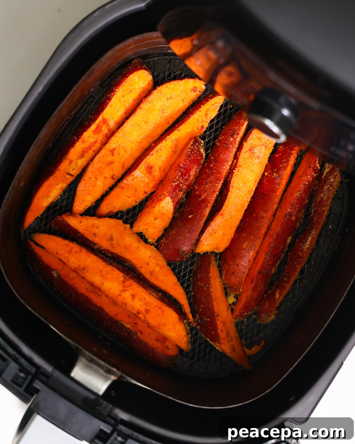 overhead of sweet potatoes in air fryer