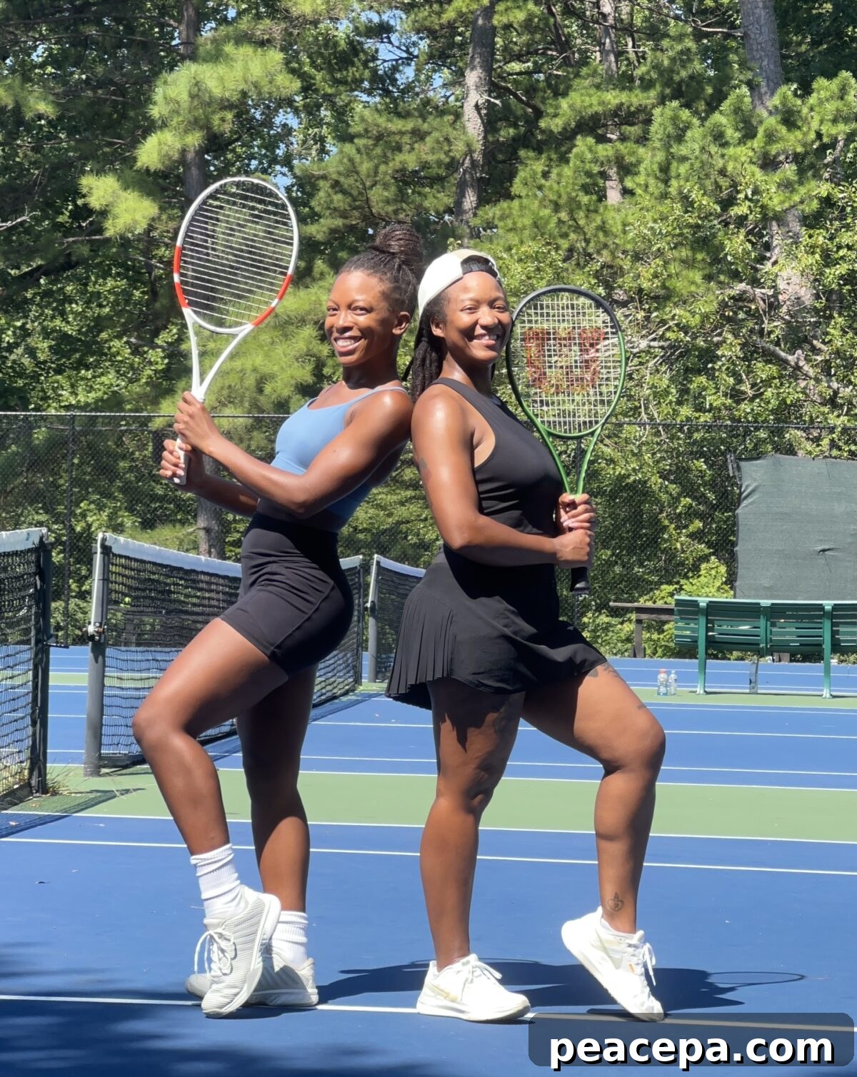 jenné and patty holding tennis rackets