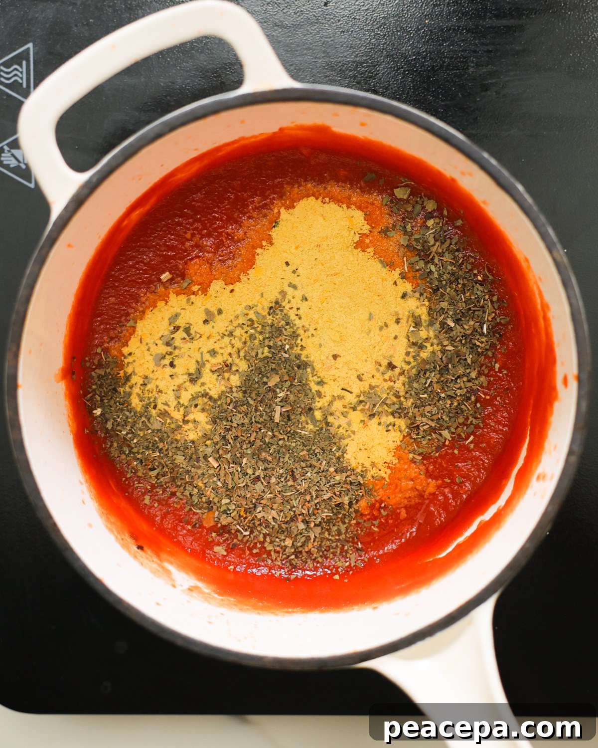 overhead tomato sauce in pot