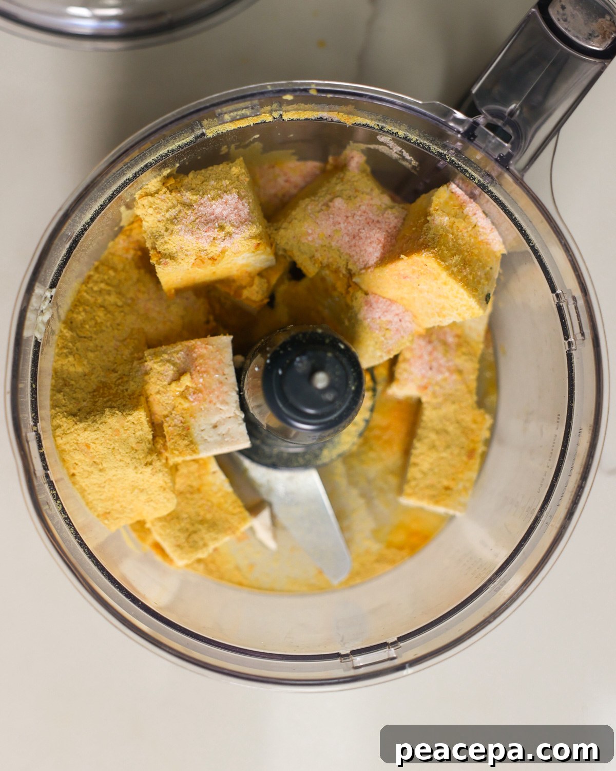 overhead tofu cheese ingredients in blender