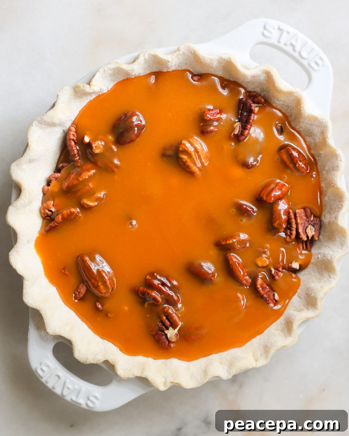 sweet potato filling over pecans in crust