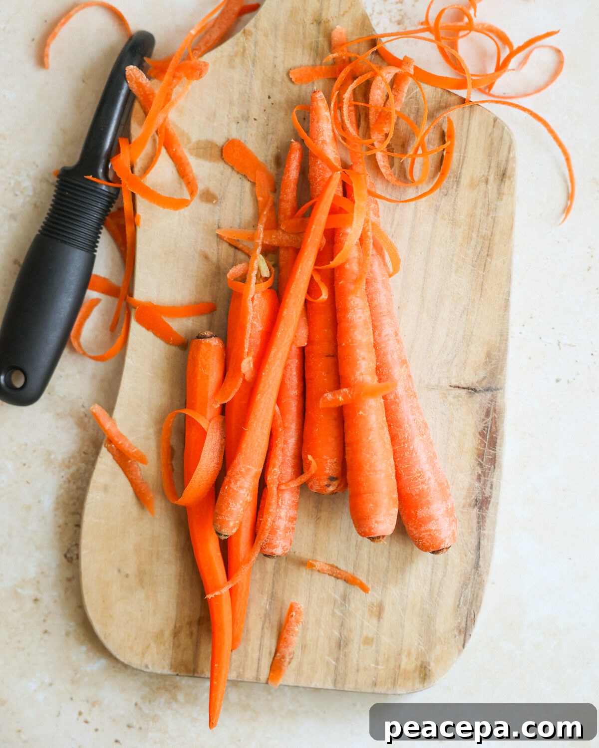overhead peeling carrots