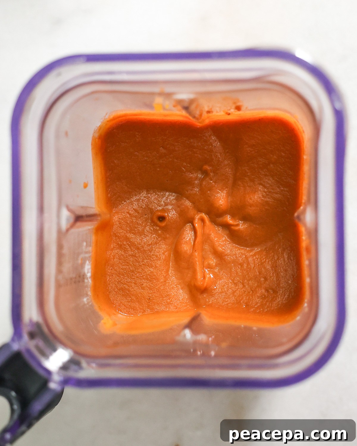 overhead of a blender with vegan sweet potato pie filling