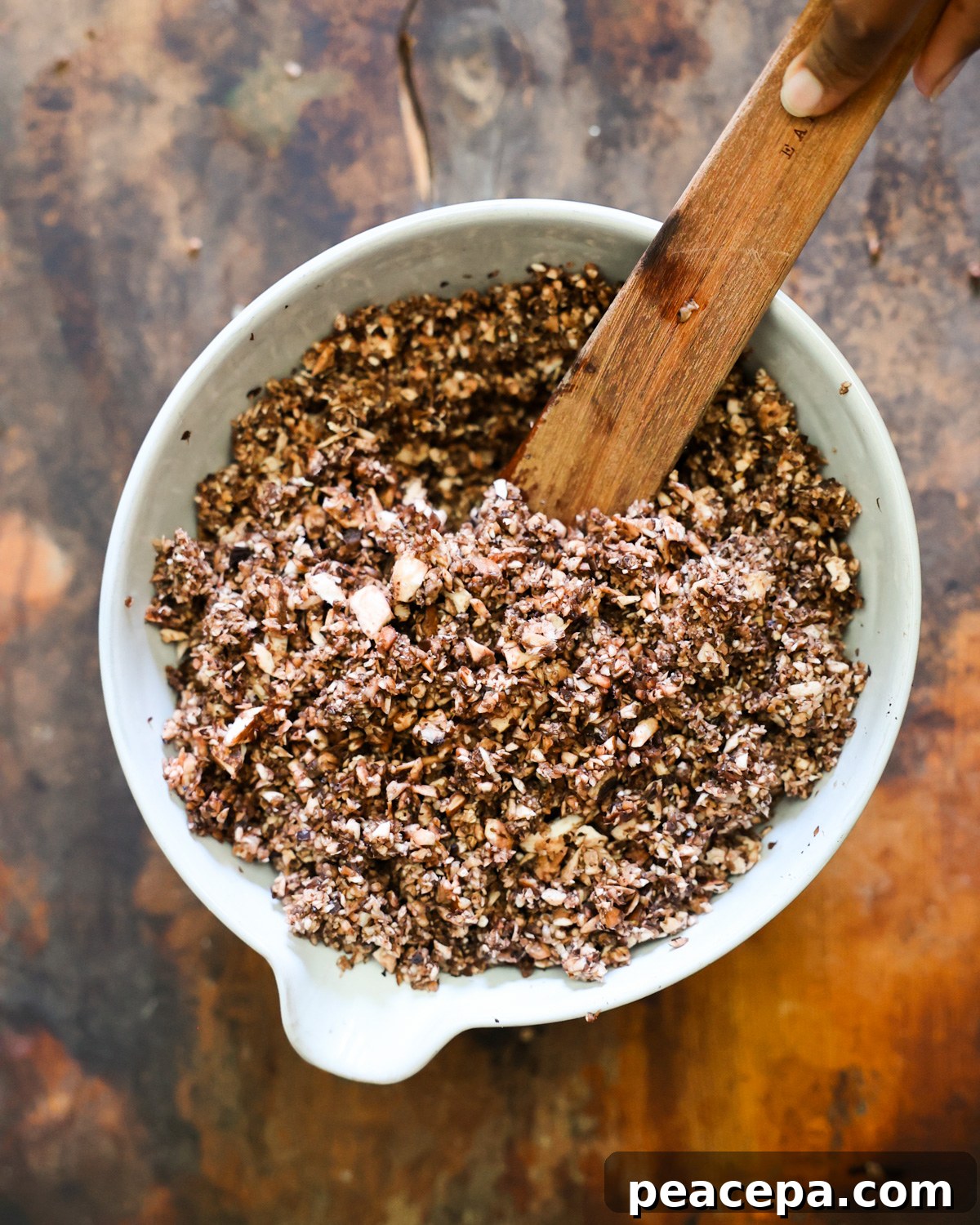 An overhead shot of the finely chopped mushrooms before cooking.
