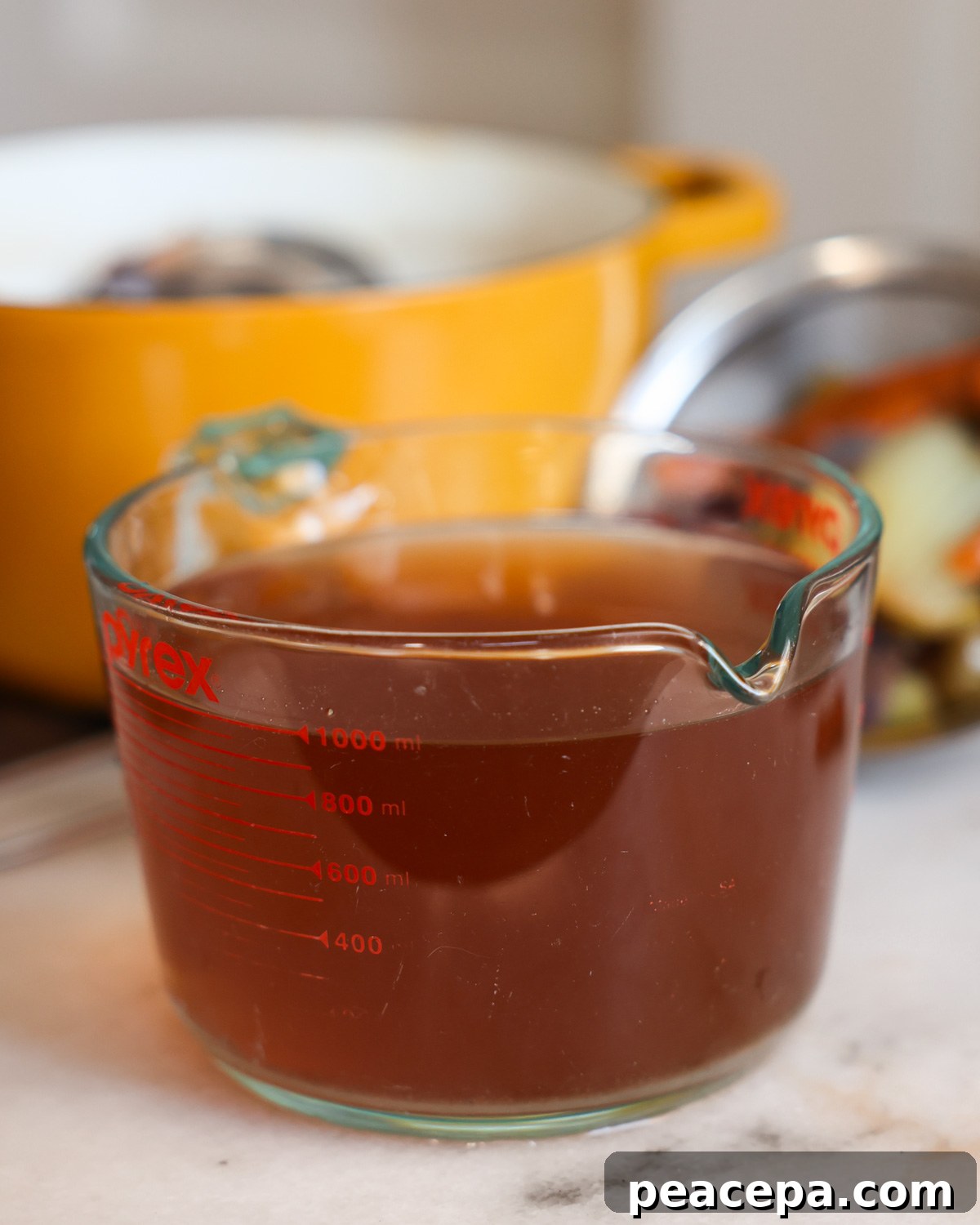 strained homemade vegetable stock