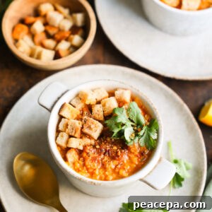 red lentil carrot soup in bowl