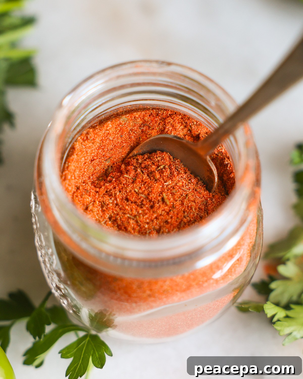 overhead of creole seasoning in jar