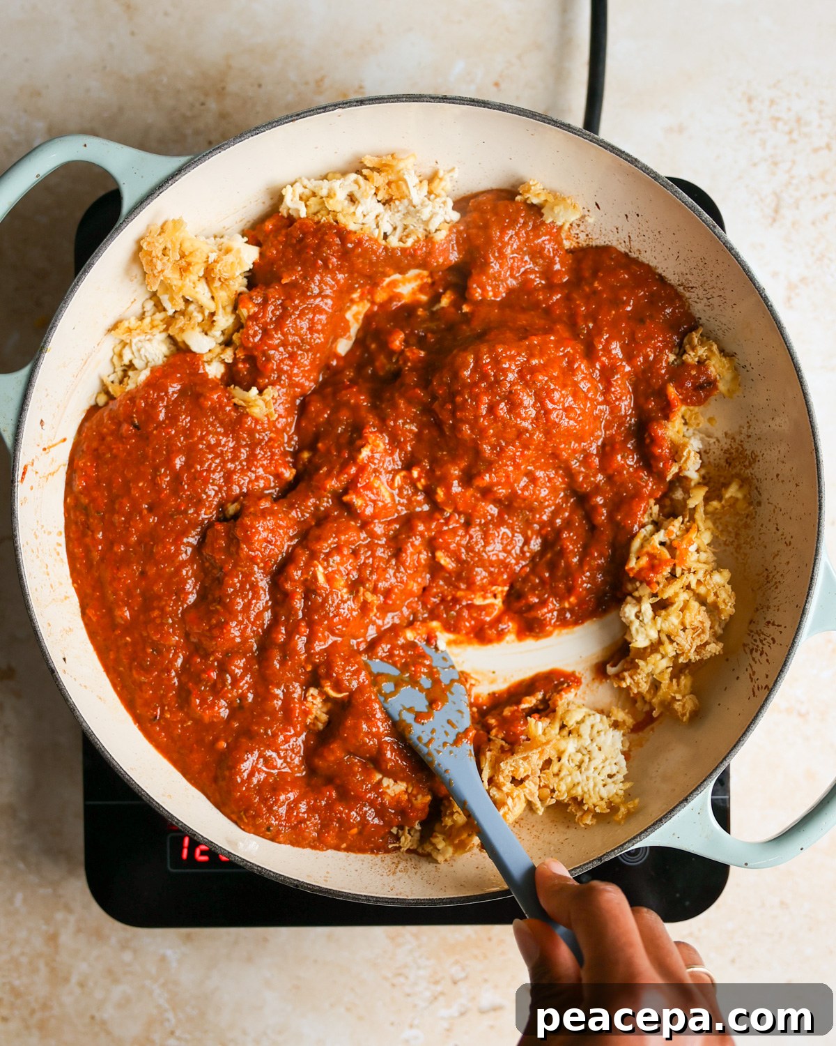 Sofrito sauce added to tofu.