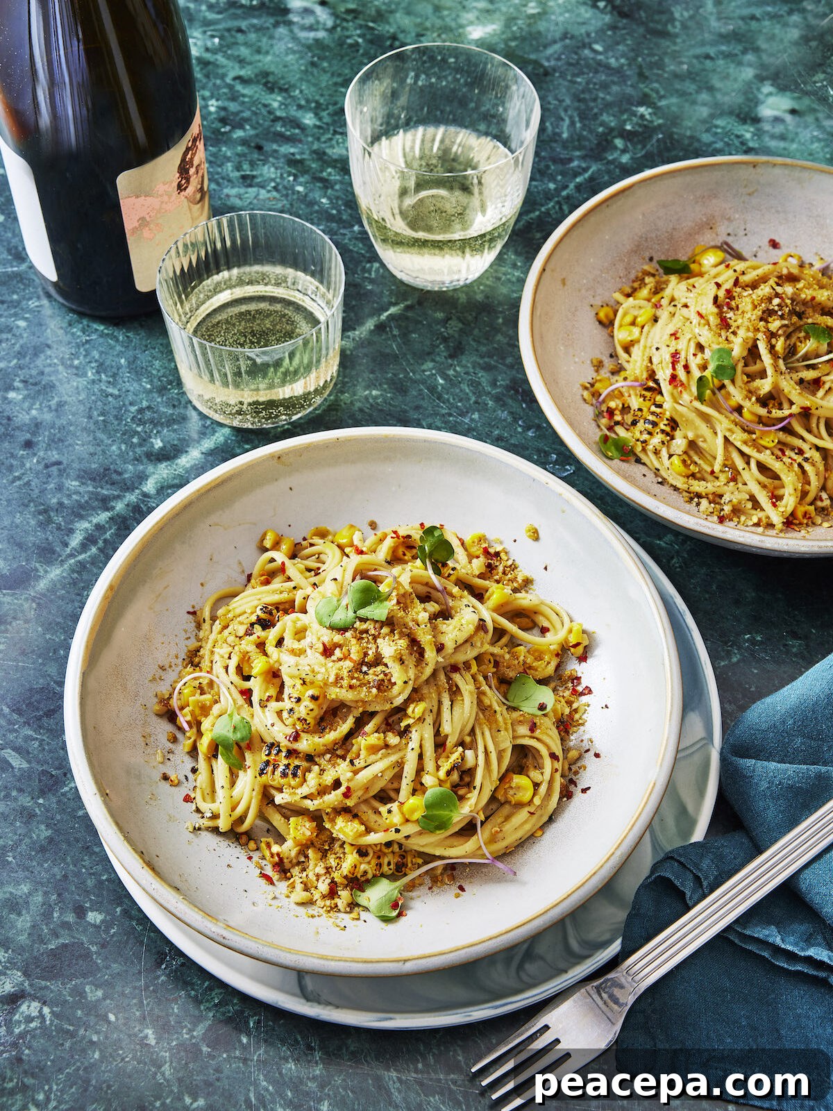 miso corn pasta on blue background