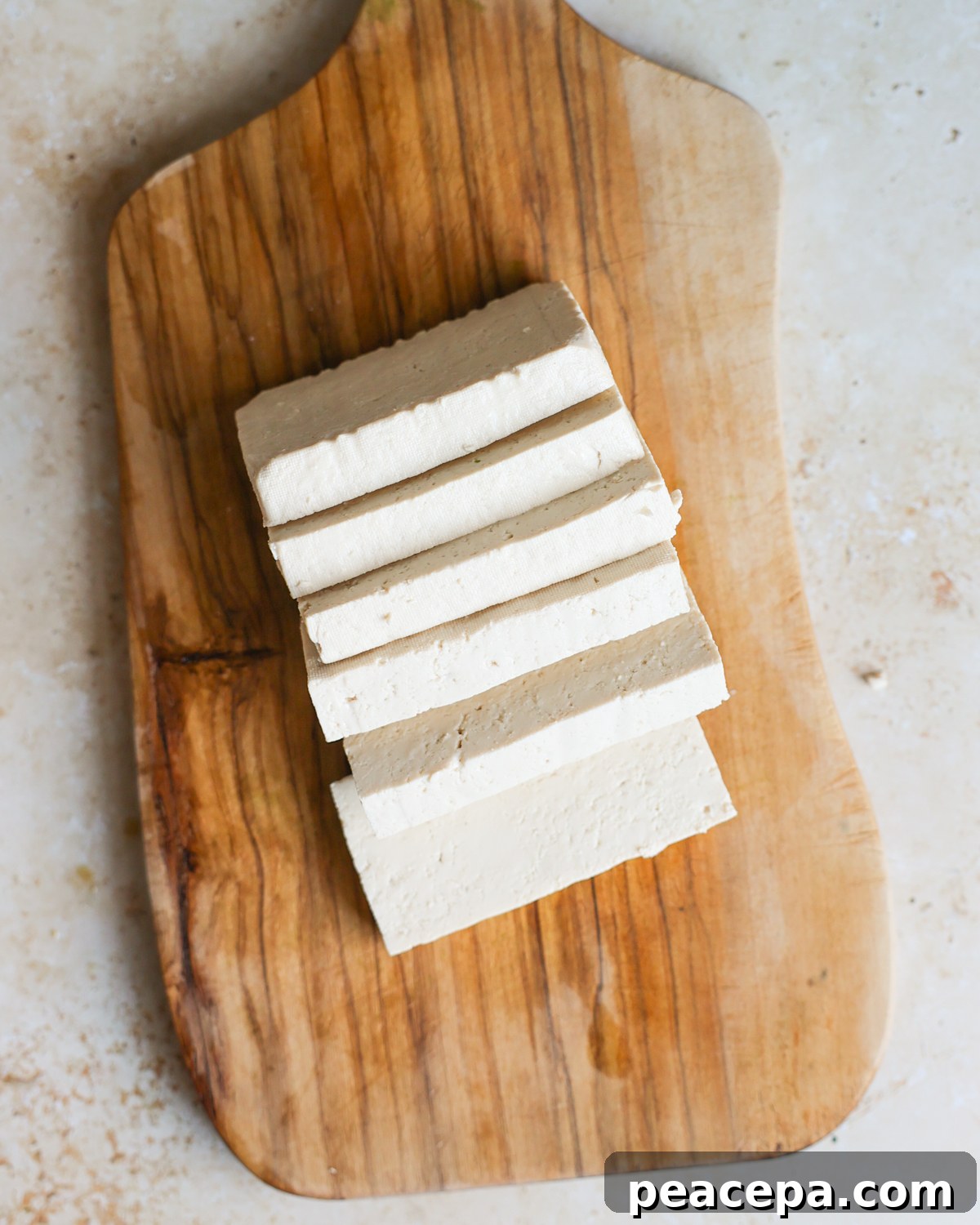overhead sliced tofu on cutting board