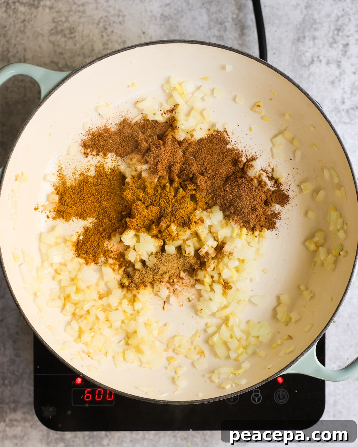 Spices added to pan.