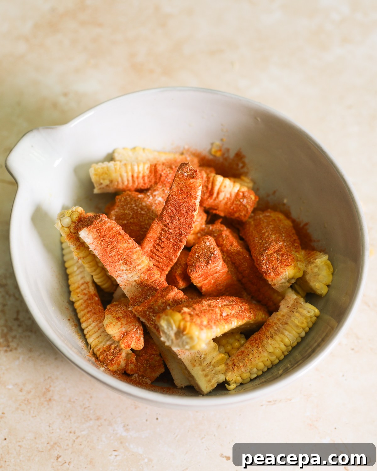 overhead of spices added to corn