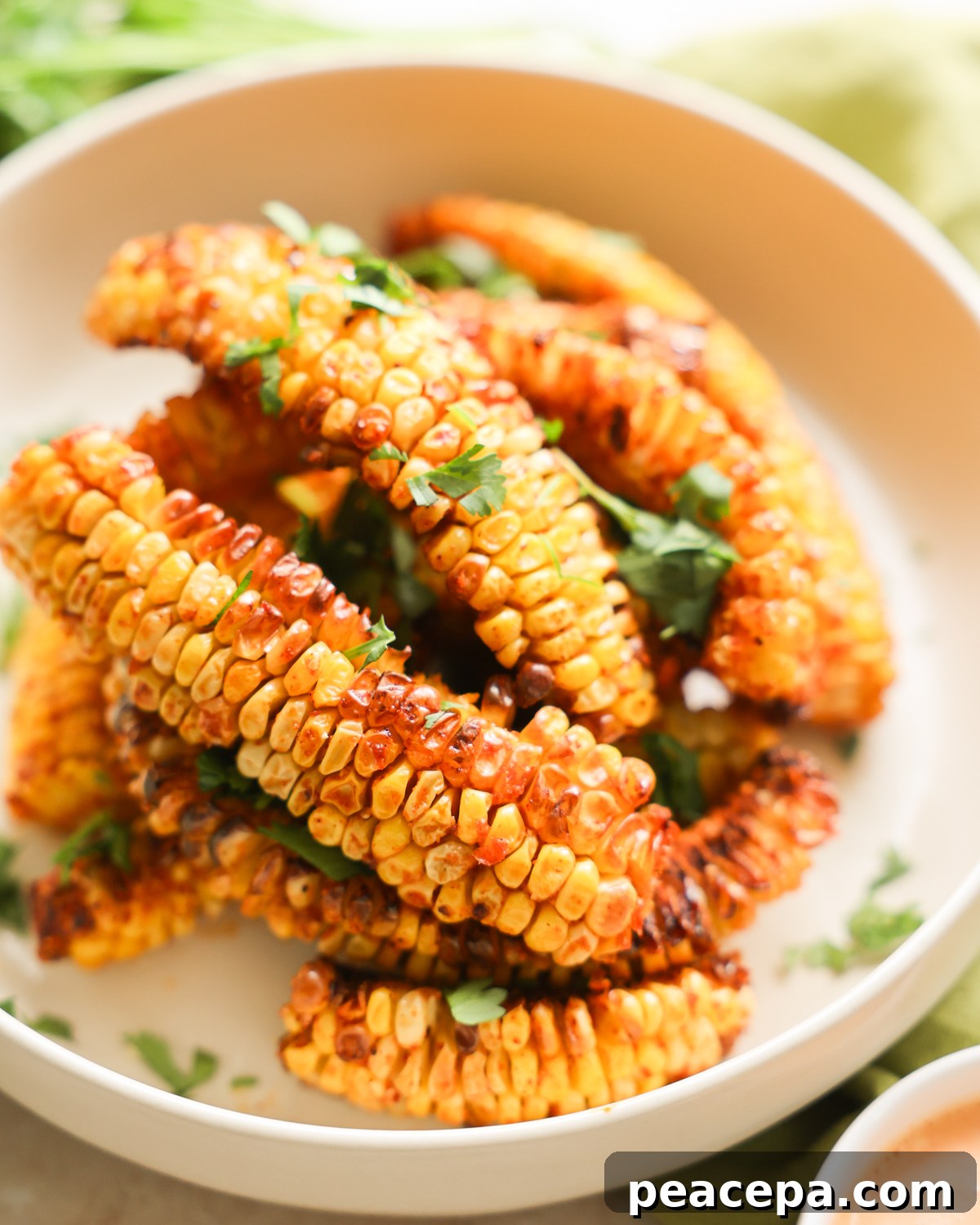 garnished corn ribs on plate