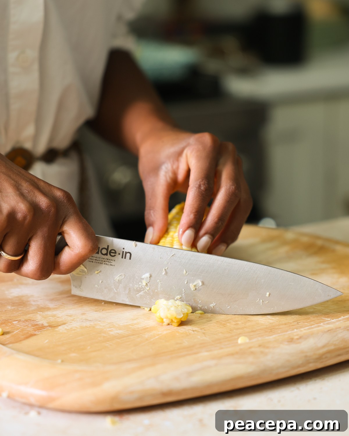 slicing tip off of corn cob