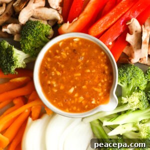 Stir Fry Sauce in bowl surrounded by veggies