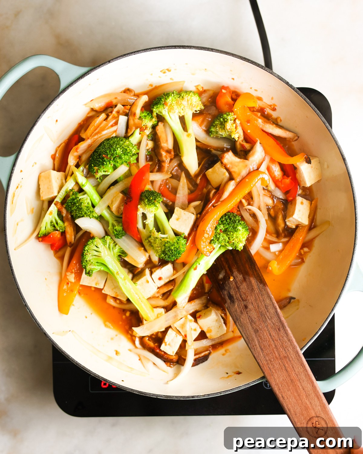 overhead of tofu stir fry cooking