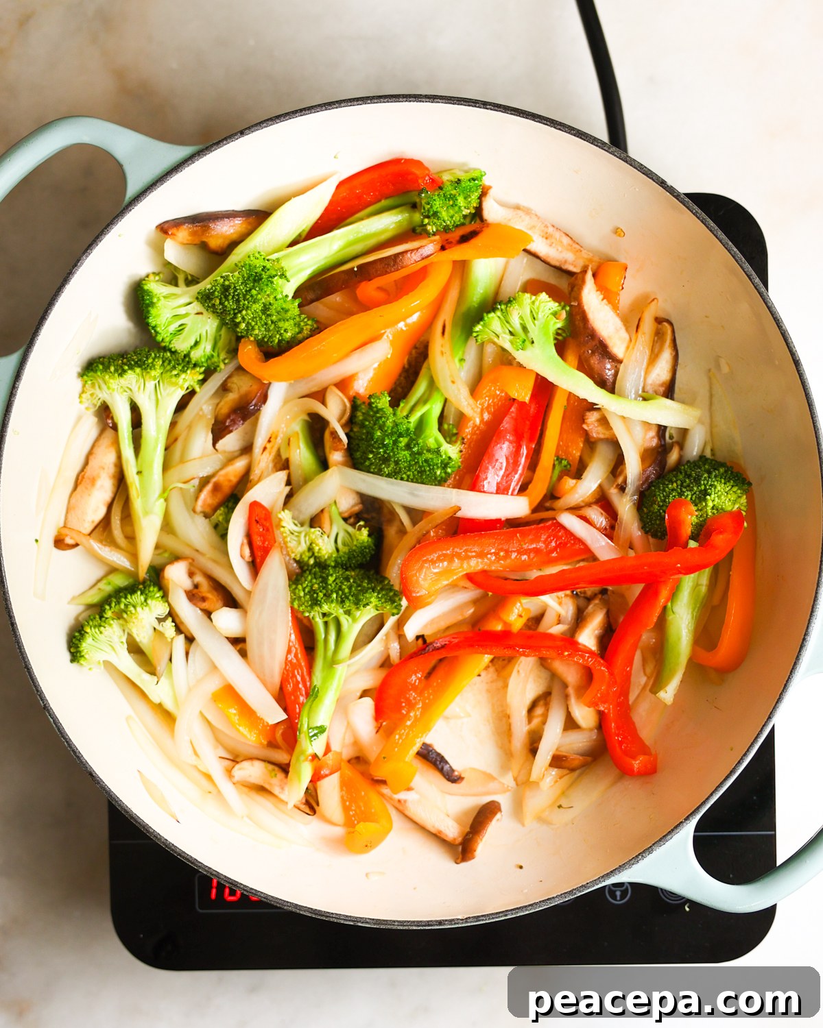 veggies added to skillet overhead