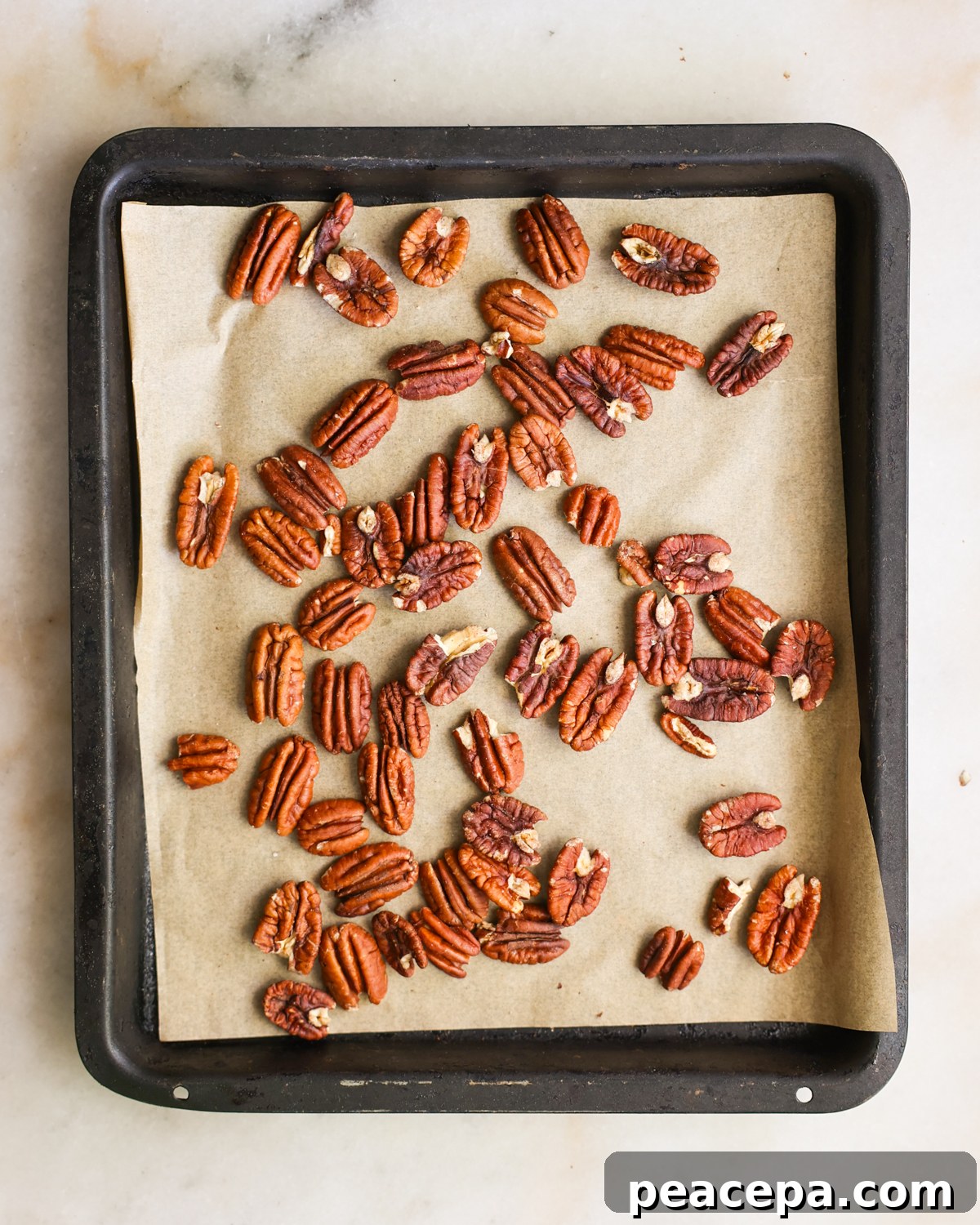 overhead toasted nuts on baking sheet