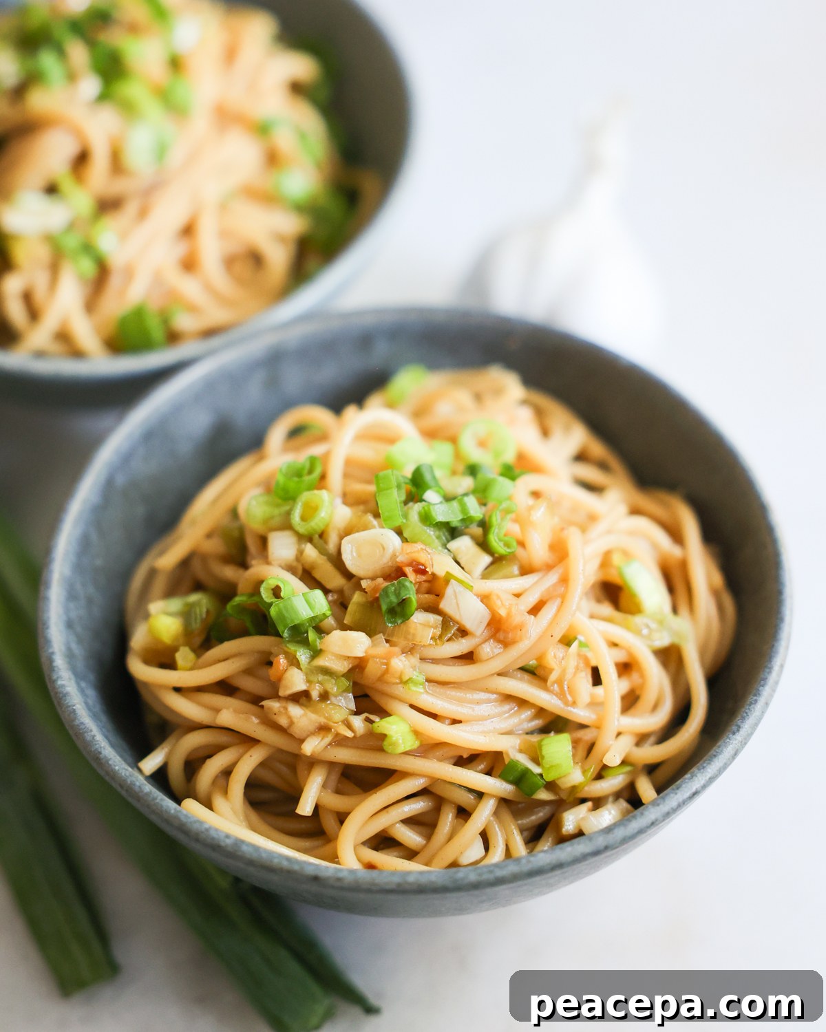 garlic noodles in bowls