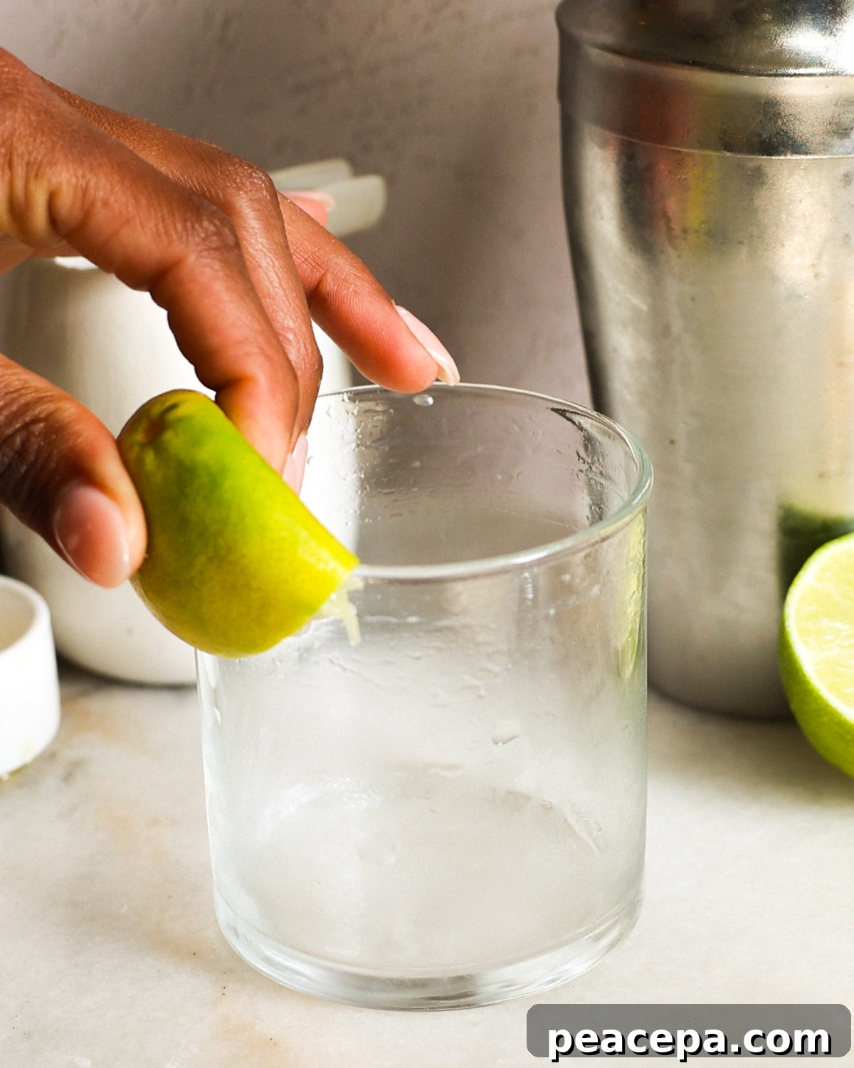 Rubbing lime on glass.
