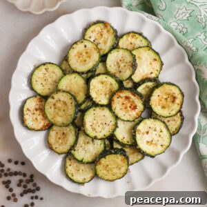 A plate of air fried zucchini on the coutner.