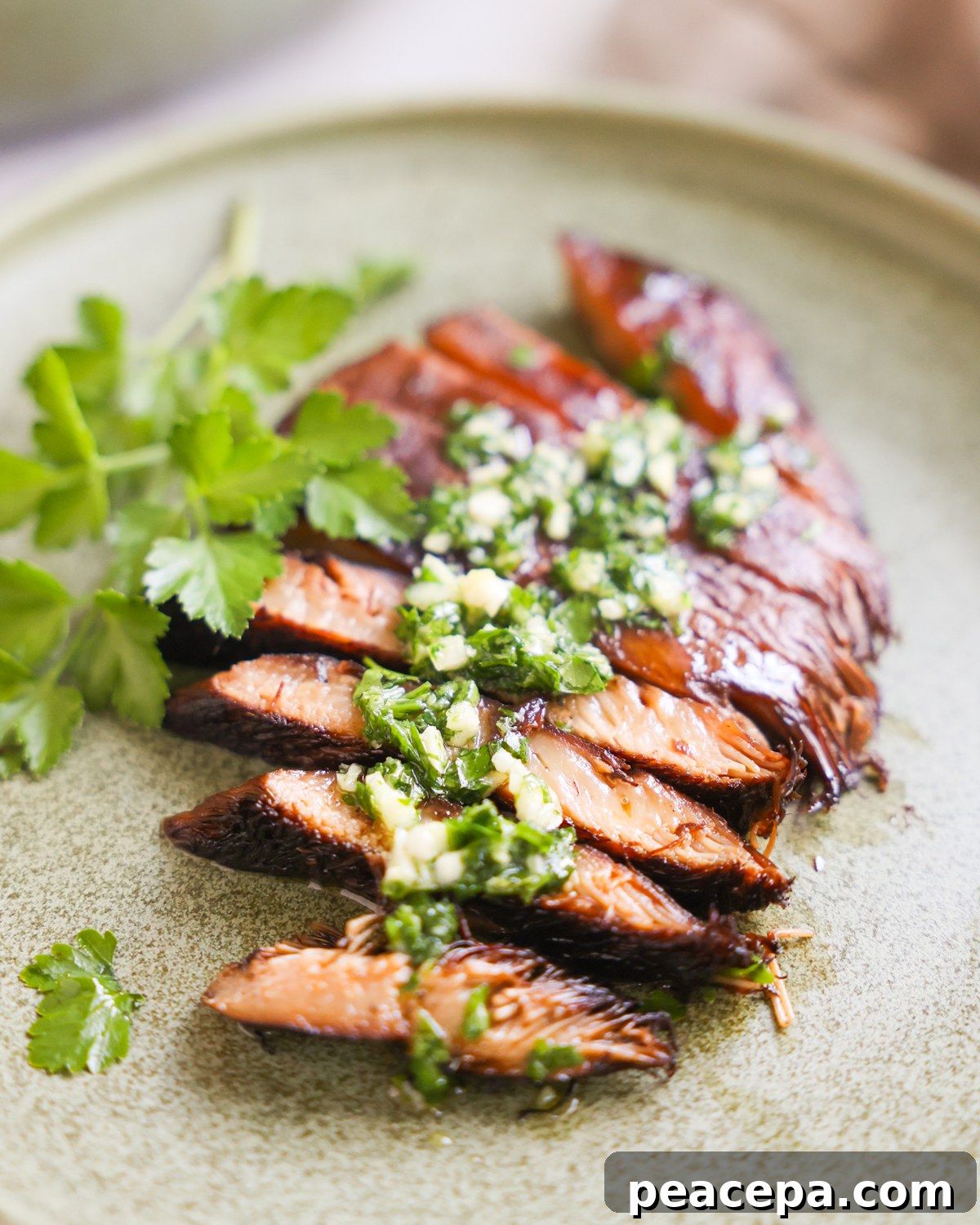 Lions mane steaks topped with gremolata.