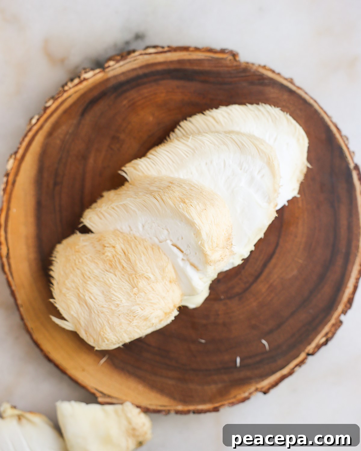 Sliced Lions Mane mushrooms.