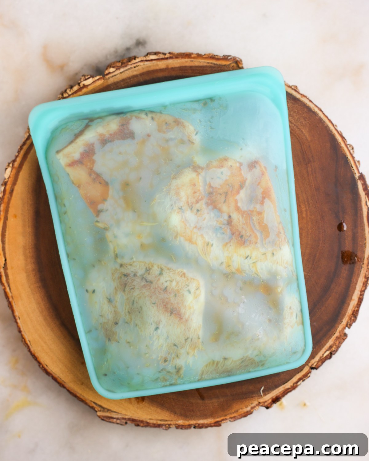 Mushrooms marinating in a zipper bag.