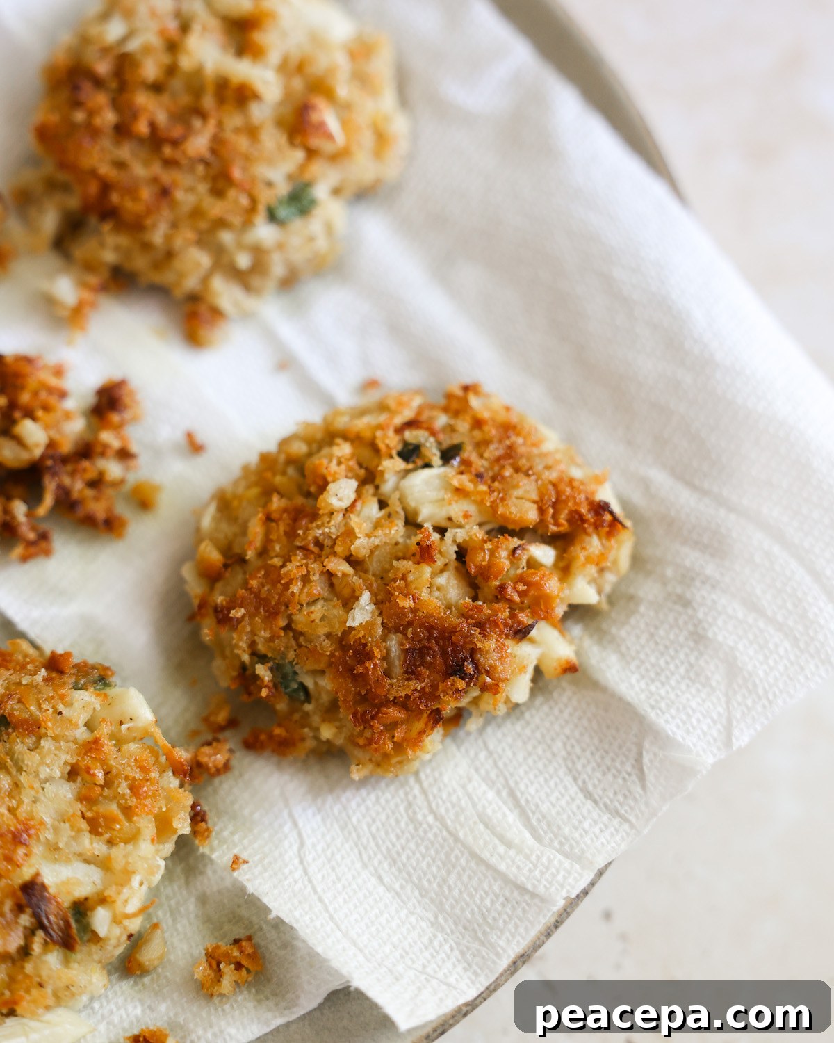 vegan crab cake on top of white paper towel